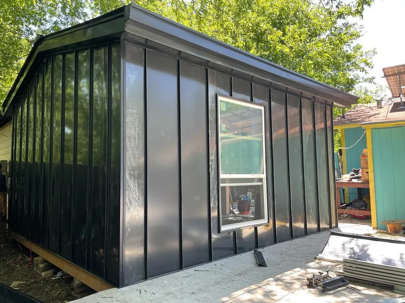 Black standing seam metal wall panels for Metal Roof Installation in New Richmond